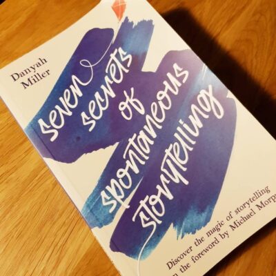copy of Seven Secrets of Spontaneous Storytelling on table