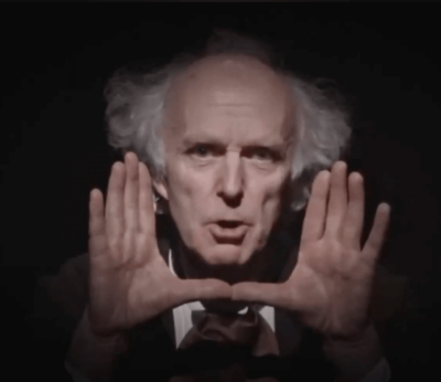 Ashley Ramsden performing a Christmas Carol.